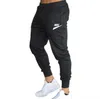 Ademende elastische broek heup pop slanke casual broek bodems lopende sportschool joggingpants mannen joggers fitness sportmerk logo print