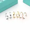 Donia Jewelry Luxury Stud Europäische und amerikanische Modebriefe Titanium Steel Threecolor Creative Designer Ohrringe mit Box5880859