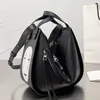 Designer väskor kvinnors väska påsar handväskor kvinnliga ansiktslösa mäns stora kapacitet tecknad spirat bort ryggsäck enkel axelväska 0404