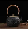 Bouteilles d'eau 1.2L Japonais Haute qualité Théière En Fonte Cuisinière À Induction Bouilloire Avec Passoire Théière Oolong QingJi pot, timbo, fleur de poire simple mais élégante