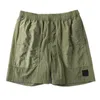 2022 Pantalons de plage Designer shorts d'été de la marque opstoney mode masculine en cours d'exécution en vrac à séchage rapide Processus de lavage de tissu de coton pur gonng mode nouveau short konng