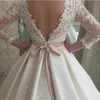 Formal Bridal Gowns Boat Neck Long Sleeves Lace Wedding Dresses backless Applique Sweep Train vestido de Ball Gown