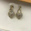 Pendientes de cristal de lujo de la marca Pendientes de diseño de amor de diamante lleno de moda para mujeres Pendientes de acero inoxidable de alta calidad chapados en oro de 18 quilates Joyas