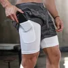 Short de course rétro de randonnée camouflage Short de compression pour hommes avec poche pour téléphone Double pont Séchage rapide GYM Fitness Jogging Entraînement Short260o