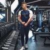 Koszula biegowa Mężczyźni Mesh Oddychająca Patchwork Fitness Topy Tees Sport T-Shirt Siłownia Trening Krótki Rękaw Workout Sportswear Koszulki 220407