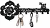 Pequenos porta-chaves pretos porta-chaves para pendurar na entrada em racks montados na parede