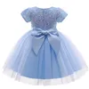 2022 abito da ballo con paillettes Flower Girls Abiti Sheer Neck Cap Maniche Applique Sash Perline Pizzo Tulle Tutu Infantile Festa di compleanno Abito da spettacolo