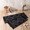 Tapetes de carpetes nodic estilo tecido de algodão cor de cor sólida de piso de chão de tassel tlassel bedroom alimentos alimentos de sacada de sacada de lanchonete capa de sofá de toalha de toalha