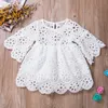 Mode famille correspondant vêtements mère fille robes blanc creux robe en dentelle florale Mini robe maman bébé fille vêtements de fête 220803