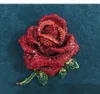 broche corsage fleur rouge