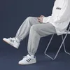 Korean Style Fashion Sweatpants Autumn Light Gray Baggy Wide-leg Pants Straight-leg Casual Tie Feet Trousers Male 220325