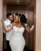 2022 vintage arabiska afrikanska sjöjungfru sexiga bröllopsklänningar brudklänningar plus storlek juvel hals illusion spetsar applikationer kristallpärlor långa ärmar