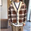 Suéteres masculinos Cardigã casual da versão coreana do suéter preguiçoso casaco selvagem de lã grossa de lã grossa de suéter de agulha