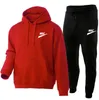 Two Piece Set Casual Fleece Tracksuit Kvinnor Vinterkvinnors uppsättningar överdimensionerade huva långärmad hoodie sportbyxor lady kostym märke logotyp