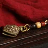 Chaveiros feitos artesanais de bastão puro de bronze para homens e mulheres Personalidade criativa Chave retro -key Jóias pendentes