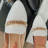 Yaz kadınları yeni vahşi moda ziyafet sandalet açık flip flop metal zinciri yılan tahıl deri tembel terlikler220514