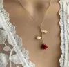 Pareja de moda regalos cadena de oro rojo estereoscópico Vertical flor colgante rosa collar para mujeres niñas regalo
