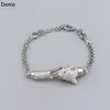 Donia Jewelry Luxury Collece European и American Fashion Leopard Leopard Titanium Micro-Inlaid Bracelet Bracelet серьги с четырьмя частями дизайнерских банкетных подарков с коробкой