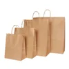 30PCS/lot 4 size kraft paper bag with handles for Wedding Party Fashionable clothes Gifts Multifunction Wholesale 220420