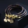 Nouvelle mode femmes plaqué or mignon coeur sac bracelet à breloques bracelets en cuir noir pour cadeau