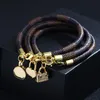 Braccialetti di cuoio neri del braccialetto di fascino della borsa del cuore placcato oro delle nuove donne di modo per il regalo