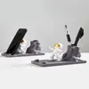 nordique créatif maison personnalité décoration résine astronaute porte-plume support de téléphone mobile pratique pendule de bureau Y200106
