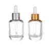Forme el envase cosmético del aceite esencial del claro de la botella 30ml del cuentagotas de cristal que empaqueta el hotsale de 1oz