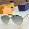 diseñador de lujo THE PARTY SUNGLASSES Z0997 LENTES Adornados con remaches característicos que recubren los bordes de cada anteojo de sol que acentúan la forma perfecta del diseño