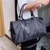 Bolsos de compras de moda Bolso de lujo Bolso de lona de nylon Hombres Mujeres Bolso Diseñador hombro Tote Calidad superior Grandes bolsos de playa lujos viajes Crossbody Monederos Negro