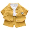 Set di abbigliamento per bambini alla moda ragazzi ragazze camicie con risvolto a maniche corte pantaloncini semplici abiti casual in due pezzi estate bambini vestiti per bambini