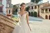 Nya högkvalitativa underbara sexiga av axel spets bröllopsklänningar v-ringning applikation golvlängd bröllopsklänning brudklänningar