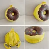 Cartoon Donut Small Mackpack na versão coreana do jardim de infância fofa infantil garoto de menino garoto de ombro de moda