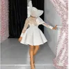 Великолепное платье с короткими вечеринками с прозрачной шеи кристаллы с длинным рукавом белые мини-колена платья до колен платья Vestido de Nooiva вечерние платья