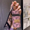 Designer Brev Nyckelringar Siden Halsduk Läppstift Nyckelringar Mode PU-läderväska Hänge Bilnyckelring Kedja Charm Brun Blomma Miniväska Trinket Present för män Kvinnor