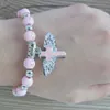 Religieuze kralenhoekvleugels kruisen armbanden rozenkrans middelpunt Heilig hart van Maria Mercy Jesus Saint Iconen sieraden 100pcs