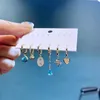 Chandelier en peluche de haute qualité 6pcs Boute d'oreilles en pierre de pierre bleue pour femmes Gold Color Cumbic Zircon Huggie Jewelrydangle