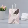 Confezione regalo mista 4 colori Sacchetto di carta Kraft marmorizzata europea Compleanno creativo Borse per San Valentino Shopping Abbigliamento Tote Regalo all'ingrosso