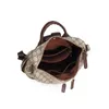 Ny ryggsäck Kvinnor 2022 Casual mode ryggsäck tryckt enkel handhållen en axel dubbel syfte resväska hörlurshål design handväska axel messenger väska