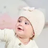 Automne hiver bébé torsion tricoté bonnet casquette mignon arc polaire chaud casquettes infantile extérieur chapeau enfants couleur unie chapeau