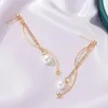 Boucles d'oreilles suspendues de pendentif de perles de lustre pendentif