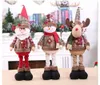 Tromba di Natale Fiocco di neve Plaid Ornamenti per bambole retrattili Decorazioni creative per finestre con pupazzo di neve di Babbo Natale 2023