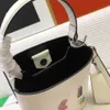 2023 Designer Handbag Safiano Leather Triangle Mini Bucket Bags Luxury Metal Applique Decorative Armpit Crossbody Bag Wholesale Letters Women1Ba217