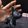 Designer Cartoon Animal Small Dog Creative Key Chain Accessories Key-Ring Pu Leather Letter Mönster bil Keychain Jewelry Gifts Tillbehör 6 Färger