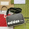 Neue Unisex Mode Designer Outdoor Sport Luxus AD Messenger Bag Umhängetasche Umhängetasche TOTE Handtasche Hohe Qualität TOP 5A 702427 Geldbörse Beutel
