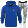 Varum￤rkeskl￤der Herr- och kvinnors tr￤ningsdr￤kter Huven Sports Jogging Suit Men Polo Shirt Jacket 001