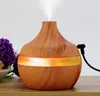 Umidificatore d'aria elettrico Diffusore di oli aromatici essenziali Umidificatore ad ultrasuoni per venature del legno USB Mini Mist Maker LED Light DLH882