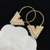 Designer Womens Armelets Halsband örhängen lyxörar Pärlhalsband Guldkedjan armband smyckesdesigners Letter örhänge 2205053D