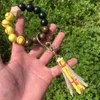 Beads Bracelet Party Favor Football Basketball Keychain Wood Bead Tassel Wristband Pendant Fashion Wristlet Bangles Holder Wrist Ring Jewelry B8159