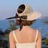 Zomer grote brede rand hoed vrouwen uv bescherm staart strand zon hoeden holle top opvouwbare lintbogen dames panama caps 220627