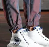 Dazzle Color Reflective Cargo Pants Uomo Handsome Joggers Casual Streetwear Pantaloni con coulisse 220330